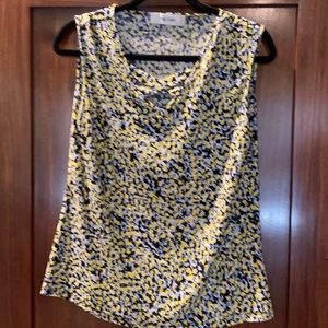 Dressy pale blue yellow and black top.